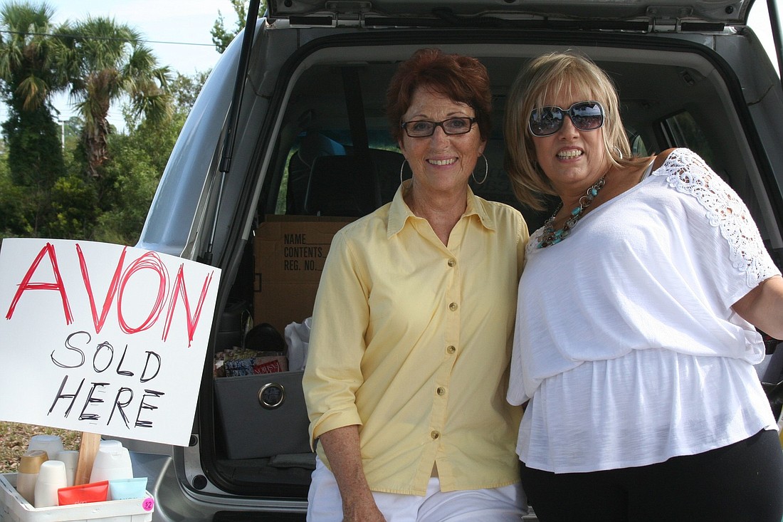 Rotary Club members Bebe Kelly and Holly Luther at the Rotary Club's trunk sale Saturday, Sept. 14, at the Food Lion parking lot at 2500 Moody Blvd. in Flagler Beach.