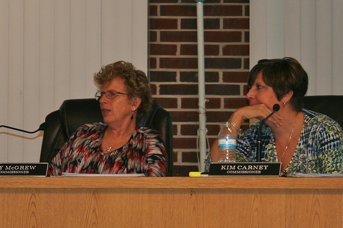 Flagler Beach Commissioners Joy McGrew and Kim Carney discuss pier improvements at a commission meeting Nov. 7.