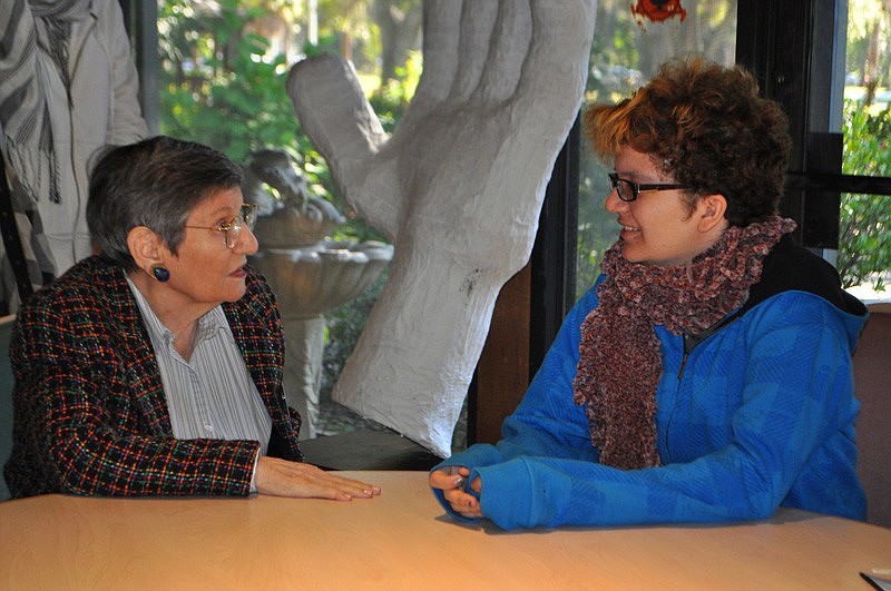 Senior Friendship Center Participant Cec Grodner and Ringling student Pinky Levine discuss the artwork they created.