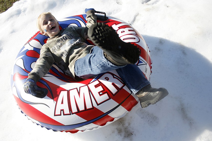 John-Thomas Duff, 7, spun in circles all the way down the snow-covered hill.