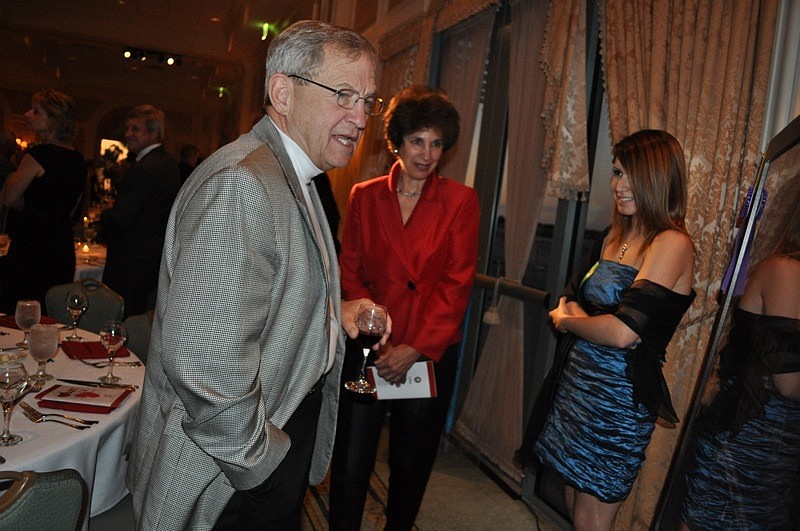 Sen. Mike Bennett, with his wife Dee, checked out the work of Lakewood Ranch High School  Taylor Lewis, whose piece took 