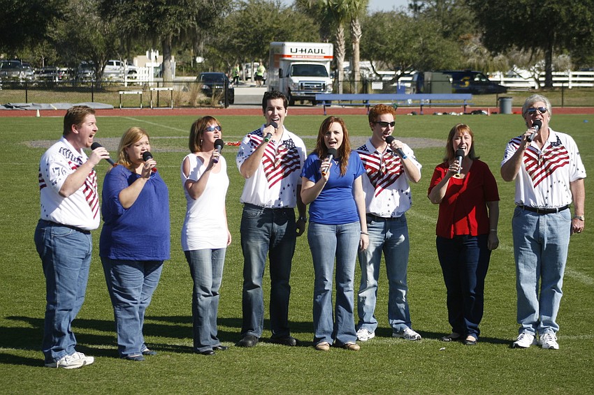 The Ditchfield Family Singers performed the national anthem before the championship game.