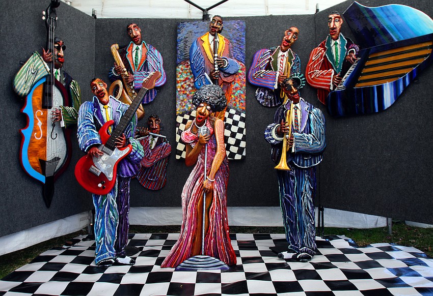 Calvin Walton from Stone Mountain, GA had a beautiful display of musicians done in mixed media on Saturday, Jan. 29 at St. Armand's Art Fair.