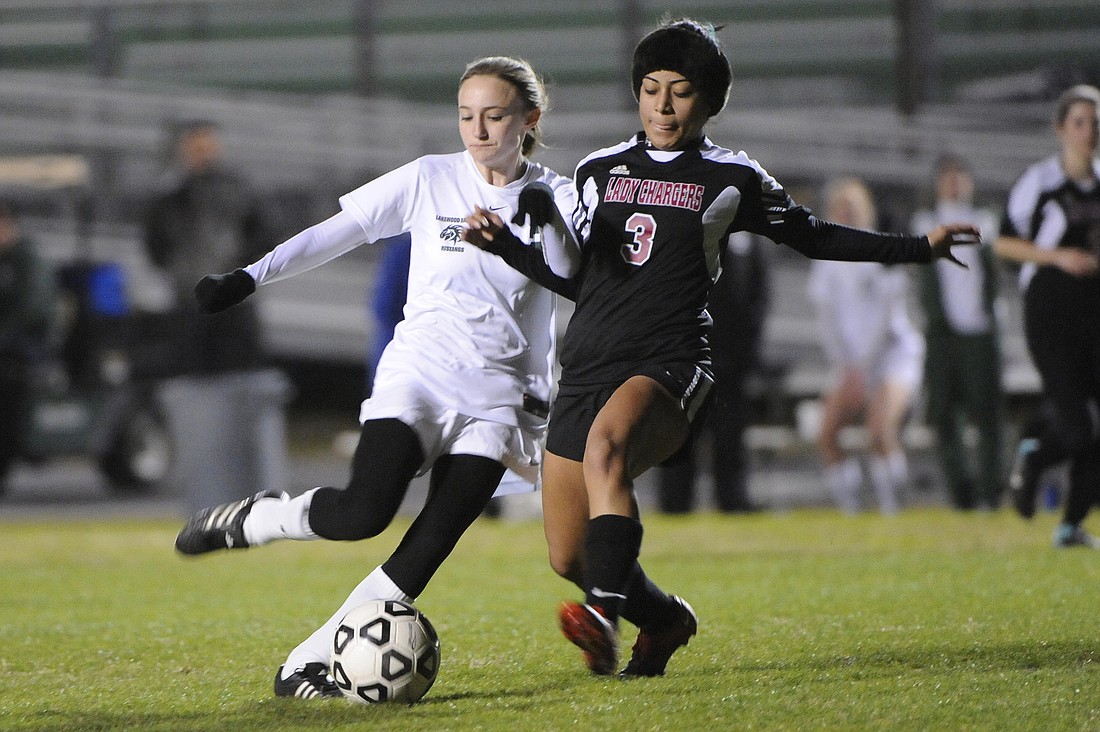 Forward Deana Haller looks to fire a shot at the end of the first half.