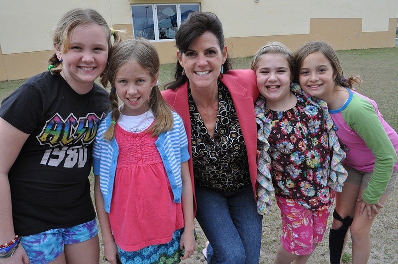 Samantha Harris and Shannon Mallard dressed up with their teacher Natasha Sinclair and classmates Rose Higginbotham and Ally Boudreau.