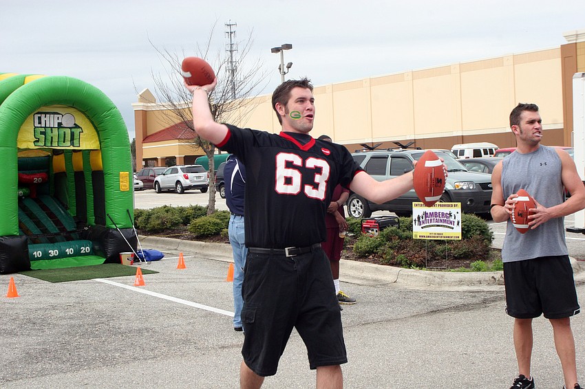 New York Giants fan Craig Wilkes tried his hand at the quarterback skills game.