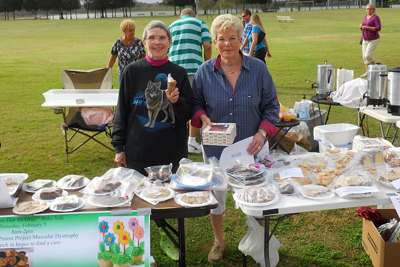 Barbara Aulenbach and Gelene Listro helped with the Helping Hands "Another Day for Gray!" Bake Sale. Photo by Lee Bettes.