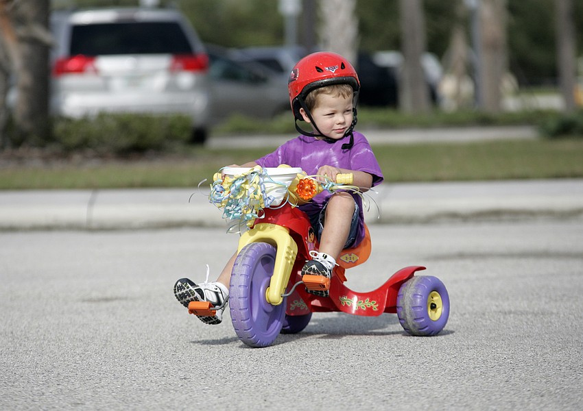 Drew Nolan, who turns 3 years old on Feb. 20, couldn't wait to take his tricycle for a spin.