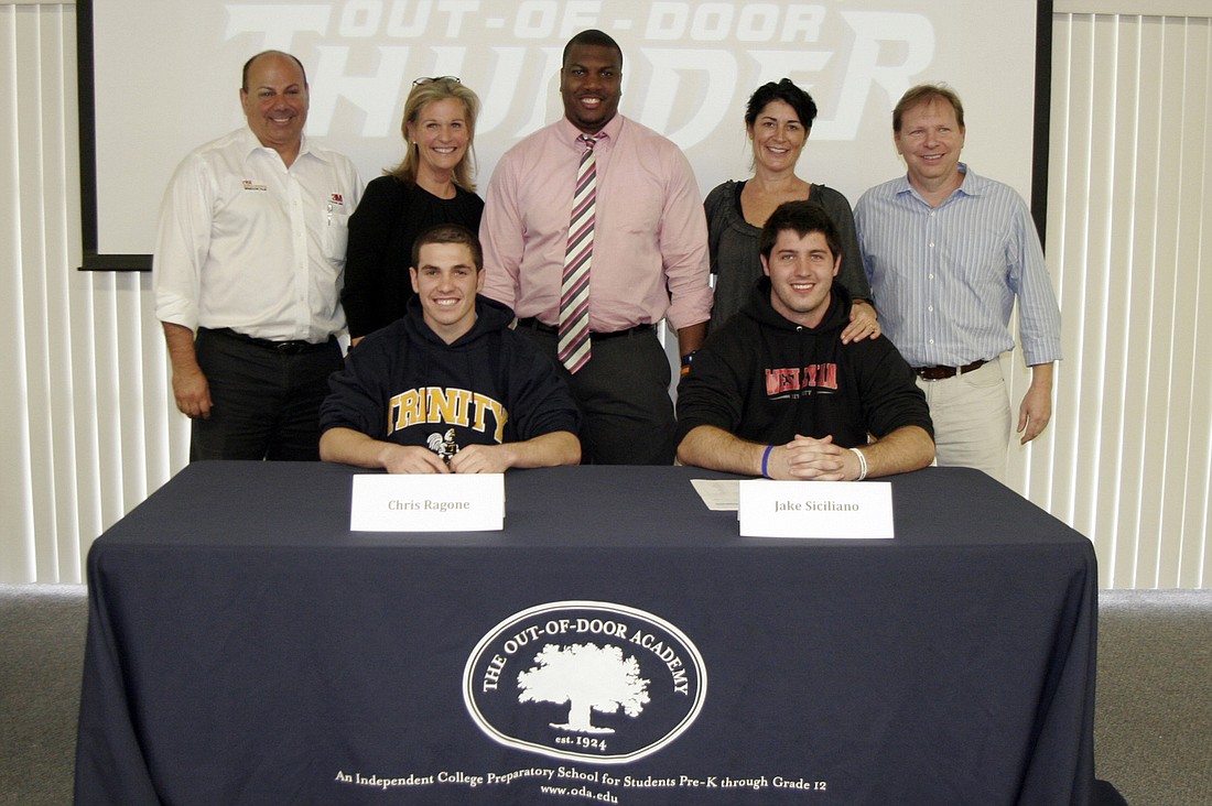 The Out-of-Door Academy's Chris Ragone and Jake Siciliano both signed national letters-of-intent Feb. 2 to play football at the next level.