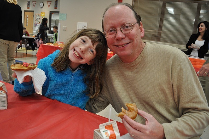 Seven-year-old Erin Williams enjoyed breakfast with her dad, Mike.