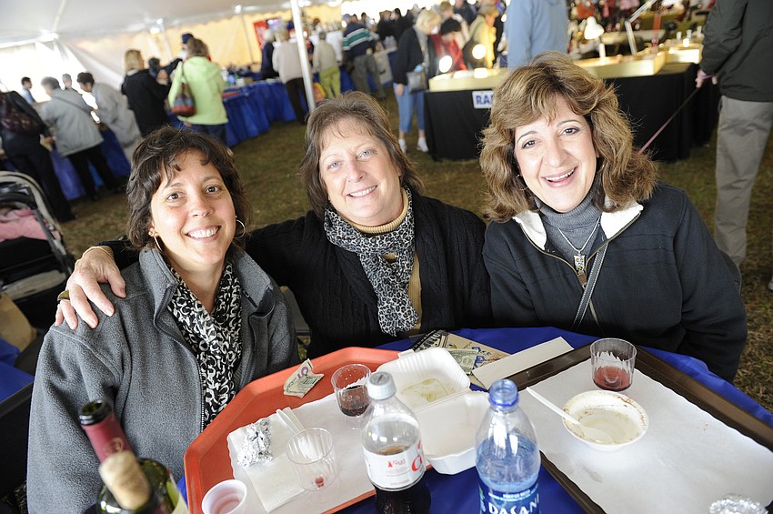 Mickey Lindfors, Becky Potter and Mary Rogers enjoyed samples of wine with their meal.