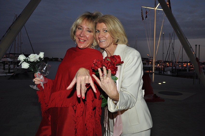 Co-Chairwoman Melissa Morrill and Laura Proctor show off their heart-shaped ruby rings.