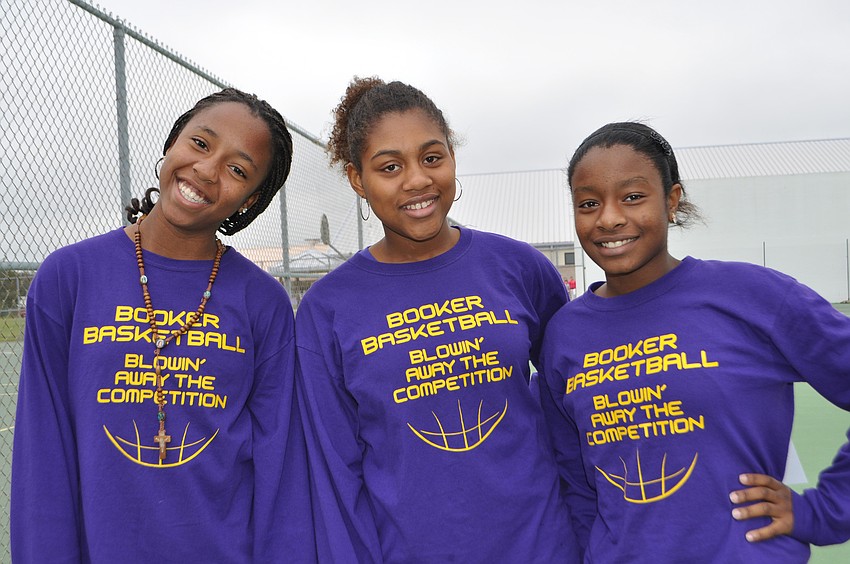Briauna Jones, Deja DuBose and Anita Clark show their school spirit in their Booker Basketball t-shirts.