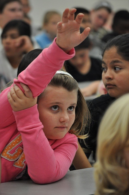Libby Moser, 10, hoped to ask presenters about the number of dogs Southeastern volunteers raise each year.