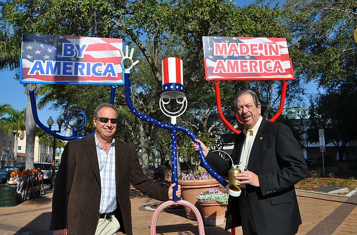 Howard Alan, Sarasota Arts Festival producer, and Florida State Representative, Ray Pilon, with Treasury Dude, center.