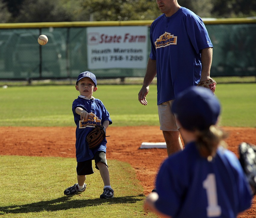 Five-year-old Bobby Dennis couldn't wait to get out on the field for his first day of practice.