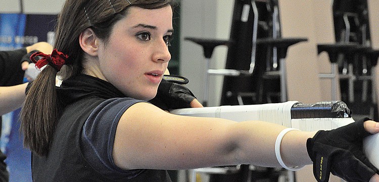 Senior Carly Bayer is performing for the first time on the winter guard.