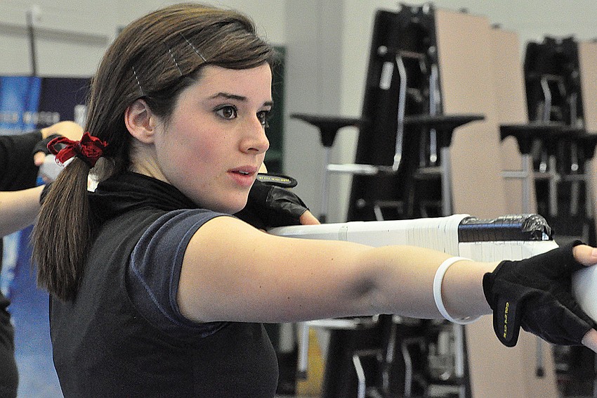 Senior Carly Bayer is performing for the first time on the winter guard.