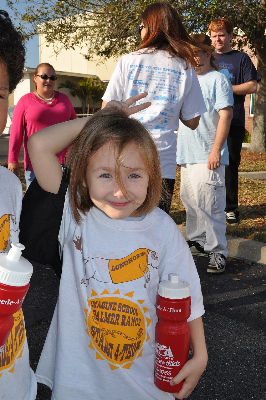 Belle Legault strikes a silly pose.