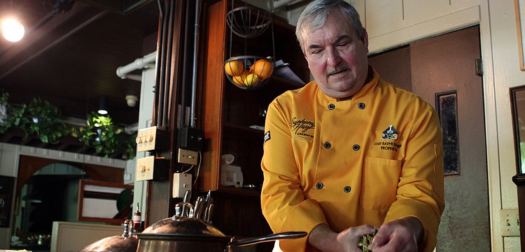 Chef Raymond prepares to steam the asparagus for the second course 
during the second class for this season's Chef Raymond's Famous Lesson Luncheons on Wednesday, Feb. 9 at Euphemia Haye.