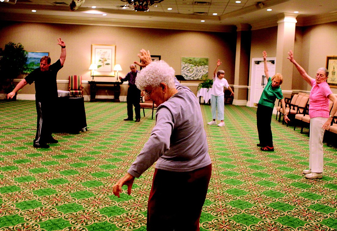 Sarasota Bay Club residents do chi tao with instructor Michael Stults, left, Friday, Feb. 18, at Sarasota Bay Club. Stults has been a chi tao instructor for 28 years and has been teaching this class at Sarasota Bay Club for 10 years.