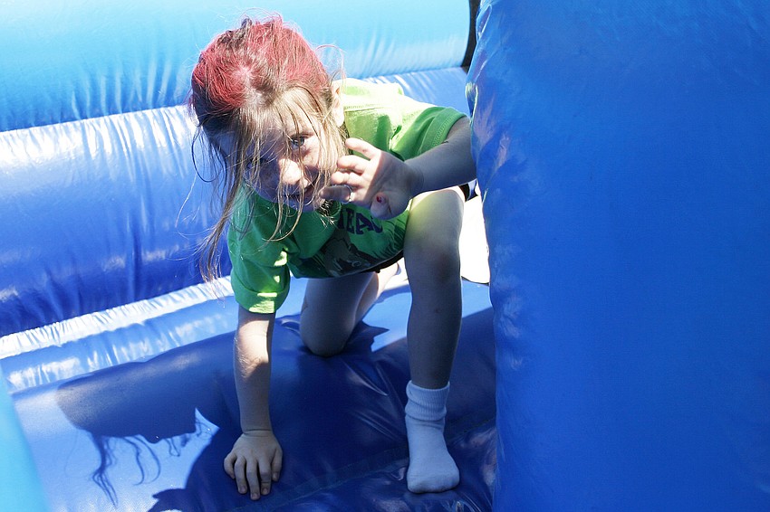Jocelyn Chapman had a blast tumbling down this inflatable slide.