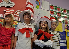 Paeten Feathers, Matt Schefer, Cayla Weinsberg and Curtis Reynolds all dressed as the Cat in the Hat.