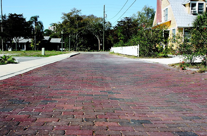 The rustic brick surface of Hawkins Court could never be removed under Laurel Park's Neighborhood Scale Preservation Project.