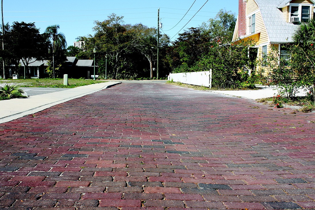 The rustic brick surface of Hawkins Court could never be removed under Laurel Park's Neighborhood Scale Preservation Project.