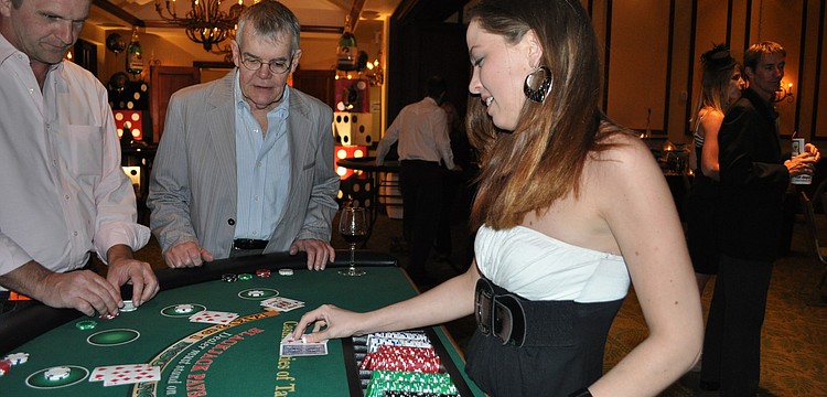 Ashley Stillwell dealt at a blackjack table.