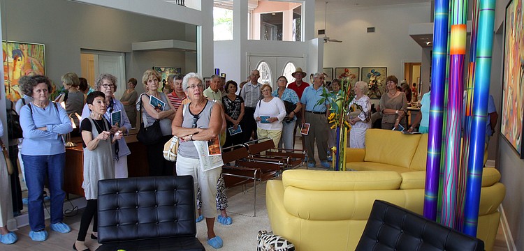 Susan Landau gives a tour of her house and talks about all the art in her house on Saturday, March 5 at her home, one of the homes on the Home and Garden Tour.