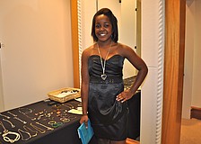 Jayna Antoine, 13, chose a black satin dress with a sweetheart neckline and sequin empire waistband. Hundreds of girls headed to Saks Fifth Avenue Monday and Tuesday in search of their perfect prom dress through the Cinderella Project.