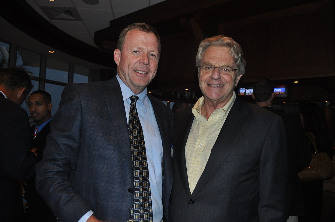 Jerry Springer, right, poses with Graeme Malloch at the St. Armands Key Residents Association annual dinner.