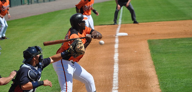 Although he walked to first base in this photo, designated hitter Vladimir Guerrero hit a long home run during the fifth inning.