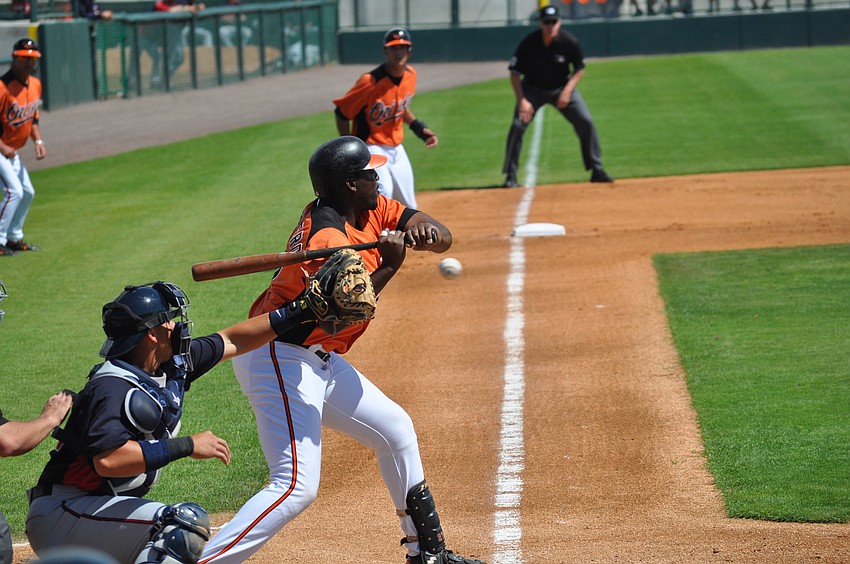 Although he walked to first base in this photo, designated hitter Vladimir Guerrero hit a long home run during the fifth inning.