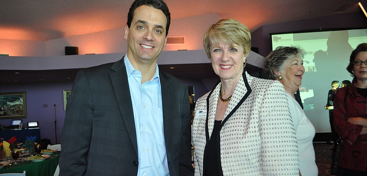 Featured speaker, Daniel Pink and president and CEO of the Patterson Foundation, Debra Jacobs
