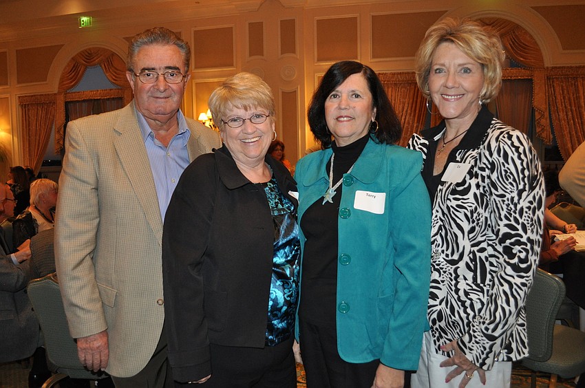 Bob and Dot Horton, Terry Sharak and Evelyn Turner sat at the same table.