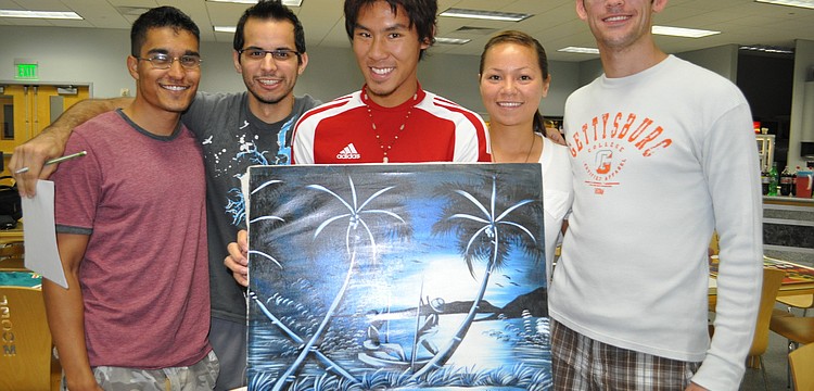 Aman Bassin, Alan Mashraghi, Chris Ng, Brooke Organ and Steve Papuchis made sure to check out the silent auction items.