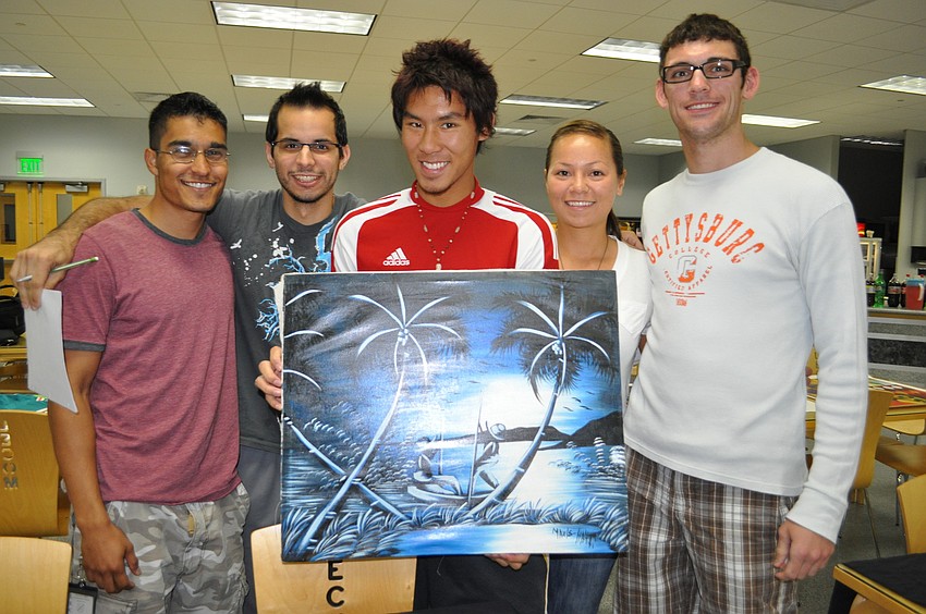 Aman Bassin, Alan Mashraghi, Chris Ng, Brooke Organ and Steve Papuchis made sure to check out the silent auction items.