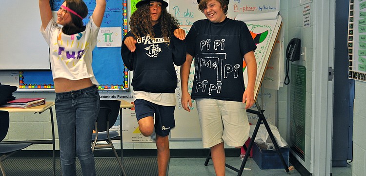 Ally Cohen, Makenzie Brown and Drew Fenner performed a skit and rap before their classmates.