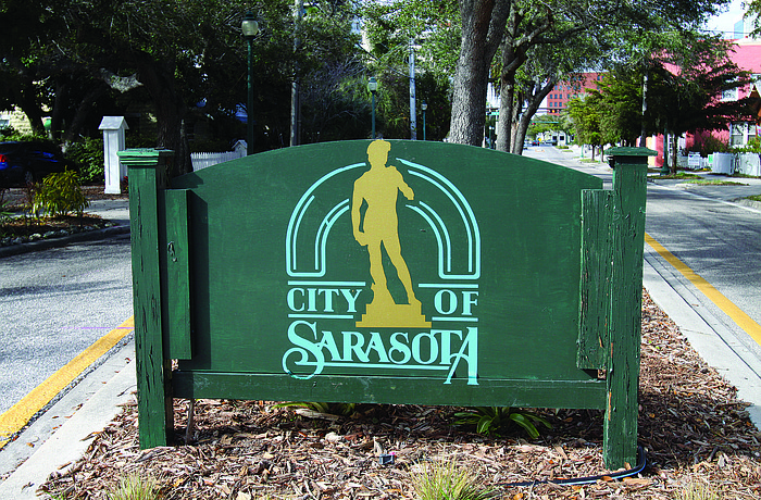 Laurel Park OKs city logo on neighborhood sign.