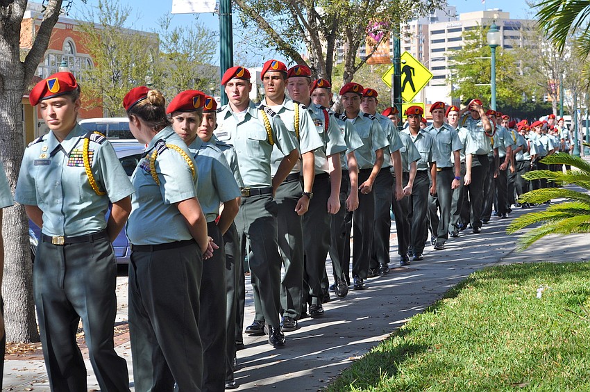 About 700 Sarasota Military Academy students marched from their school campus to First Baptist Church to attend the funeral of Sean Leonard and his sister, Jessica.