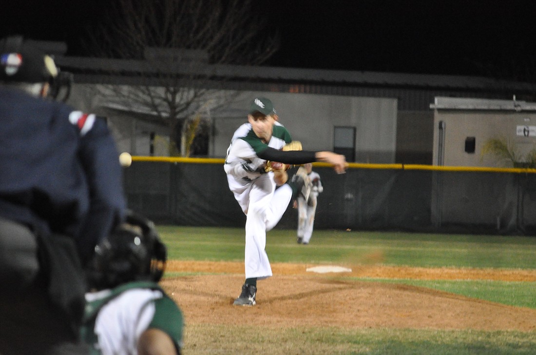 Despite issuing a walk to the first batter he faced, reliever Travis Bennett got the final three outs Friday night to preserve FPC's win over Mandarin. ANDREW O'BRIEN