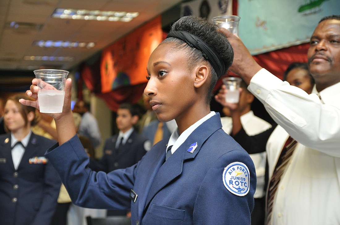 Cadet Briana Tolbert toasts to the colors.