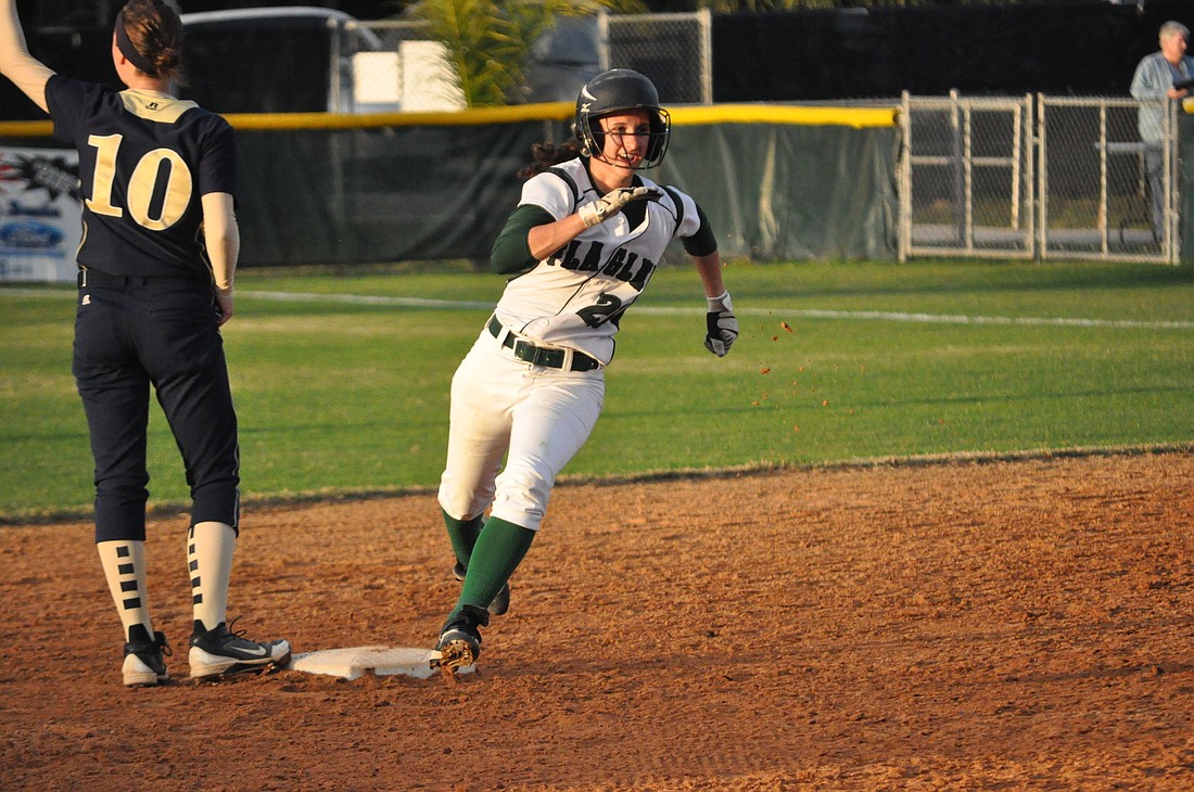 FPC center fielder Gabby Cochran rounds second on her way to third base Wednesday night against Sandalwood. Cochran scored FPC's first run. PHOTOS BY ANDREW O'BRIEN