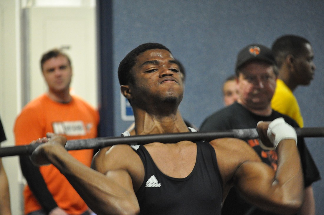 Senior Chris Santana took first place in the 129-pound class with a 500-pound total. PHOTOS BY ANDREW O'BRIEN