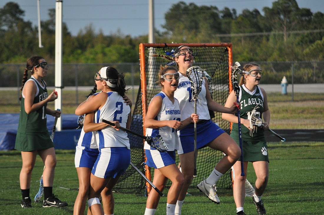The Lady Pirates celebrate their game-winning goal on Thursday. PHOTO BY STEVEN LIBBY/COYOTE PHOTOGRAPHY