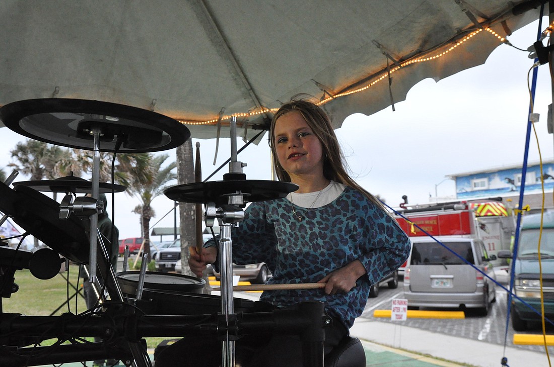 Skye Reubel plays drums Friday night with the Mason Music Group.