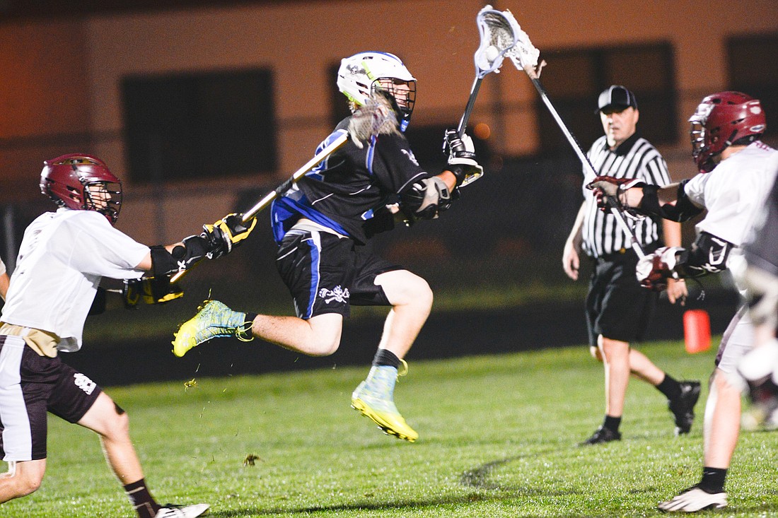 Matanzas senior Josh Holbrook scored two goals Friday night in the District 6 boys lacrosse championship. PHOTO BY BOB ROLLINS/COYOTE PHOTOGRAPHY