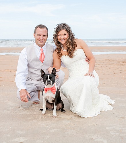 Kelly and Mike McVinney and their dog, Murphy COURTESY PHOTO BY SARA PURDY PHOTOGRAPHY